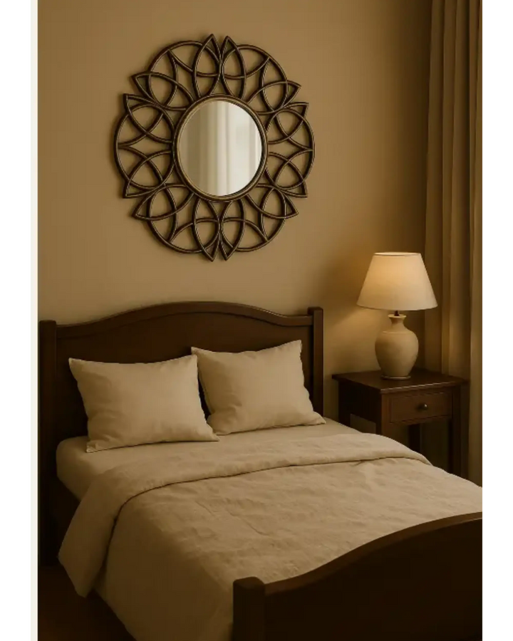 mirror with an elliptical metal frame