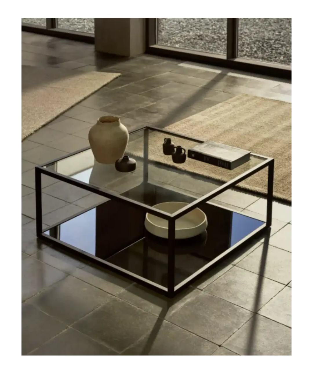Black coffee table with a glass top
