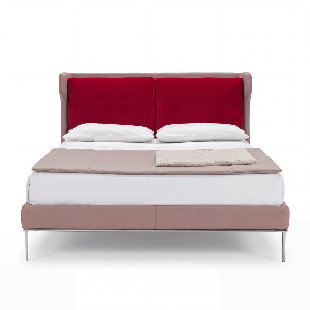 Indiga Furniture Alice bed by Luca Scacchetti featuring a pink frame and bold red upholstered headboard cushions.