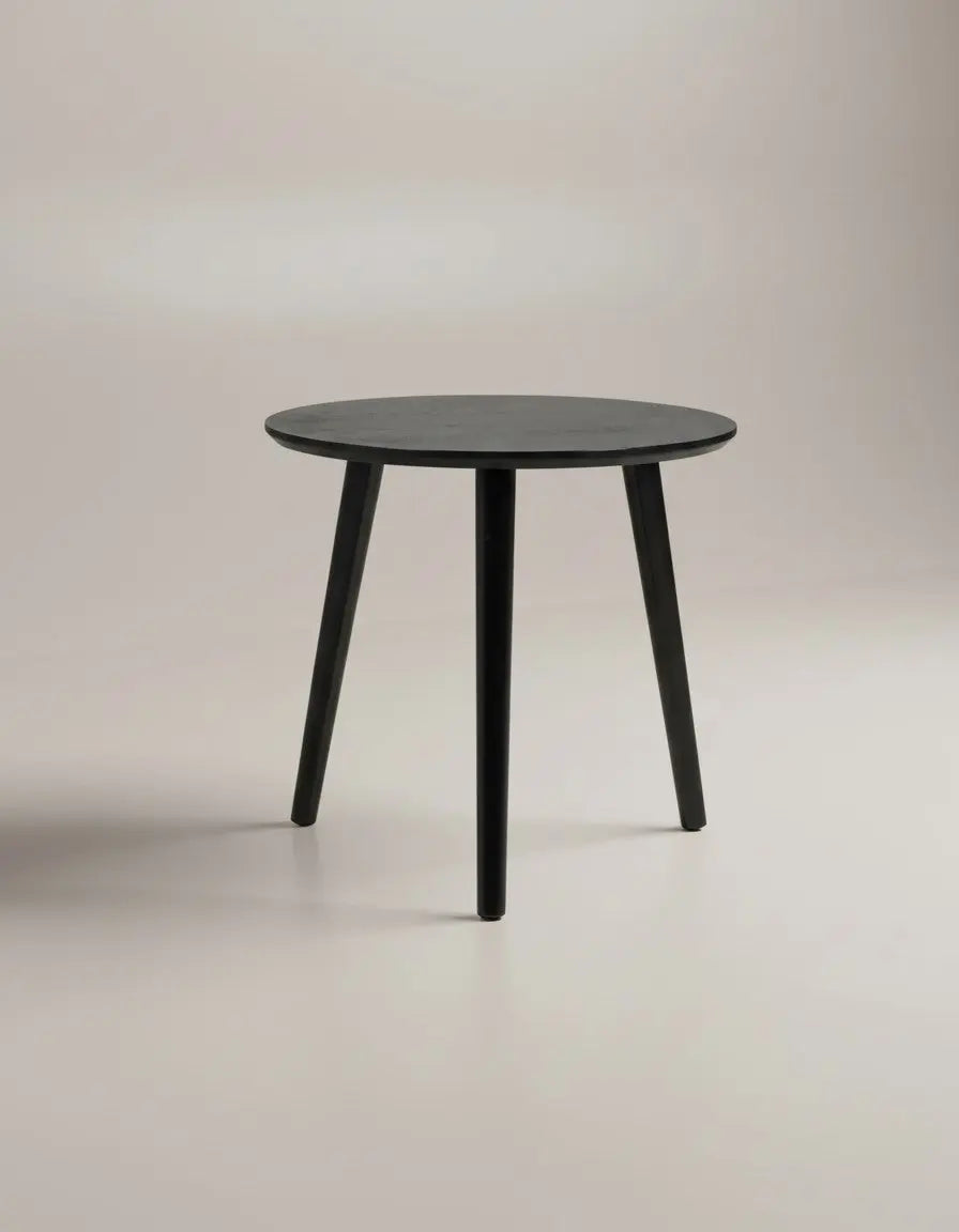 Indiga Furniture Doolin black modern round lamp table with clean lines and three tapered legs.