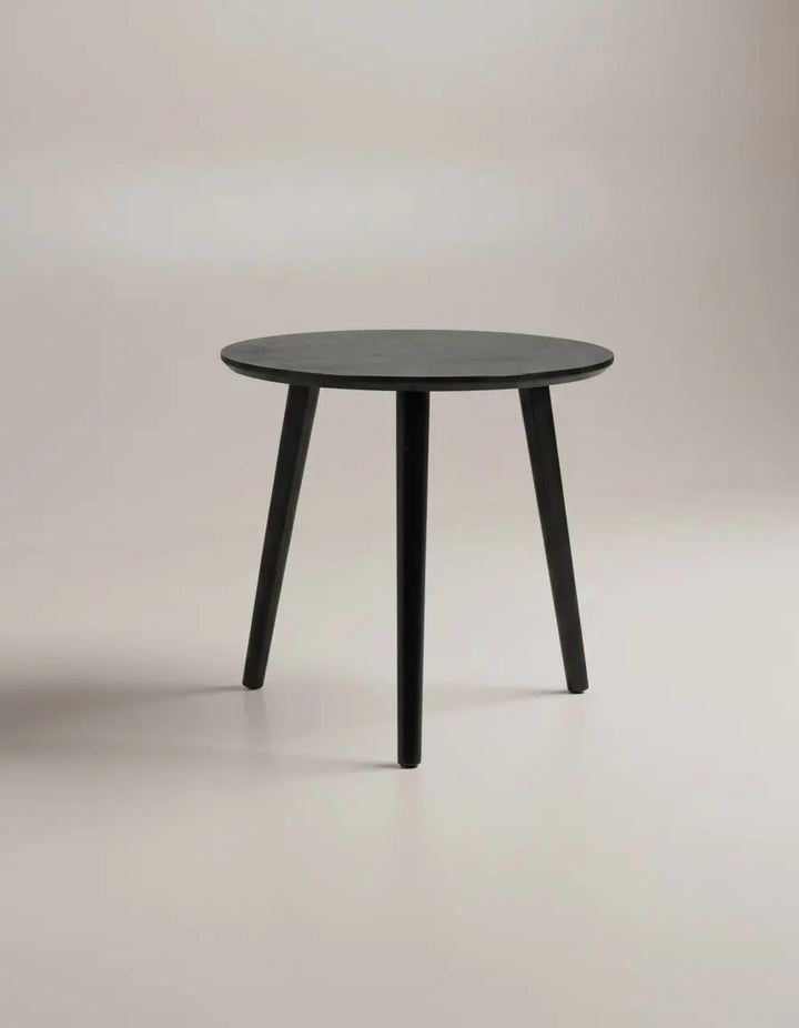 Indiga Furniture Doolin black modern round lamp table with clean lines and three tapered legs.