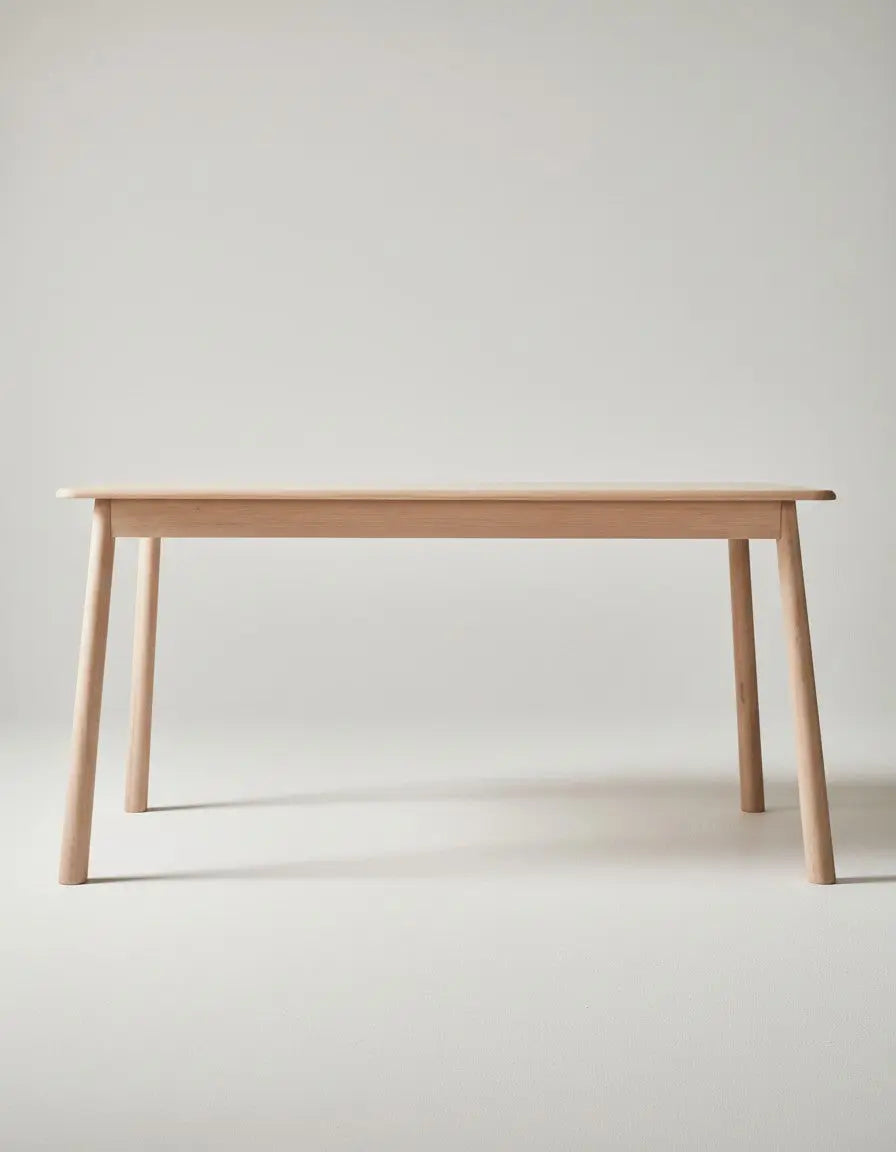 Indiga Furniture Wycombe 150 cm natural oak dining table with tapered legs, ideal for kitchens and dining rooms.